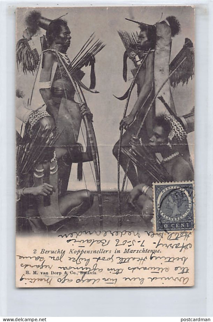 DUTCH NEW GUINEA Nederlands-Nieuw-Guinea - Beruchte Koppensnellers in Marschtenue - Head hunters - SEE SCANS FOR CONDITI