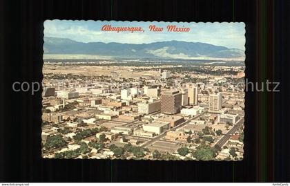Albuquerque Skyline with Sandia Mountains aerial view
