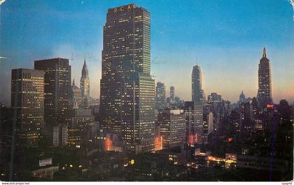 CPM Night Falls on Midtown Manhattan Showing RCA Building Chrysler Building and Empire State Building