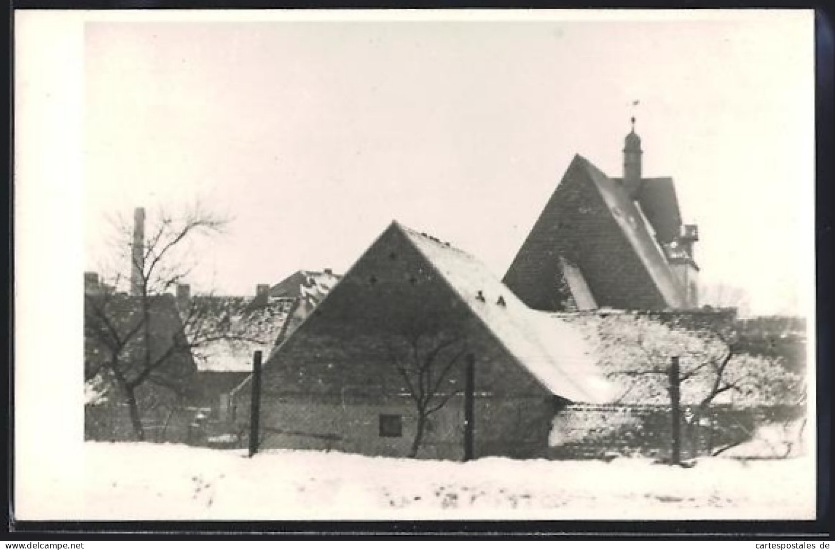 Foto-AK Zörbig, Kirche und verschneite Häuser