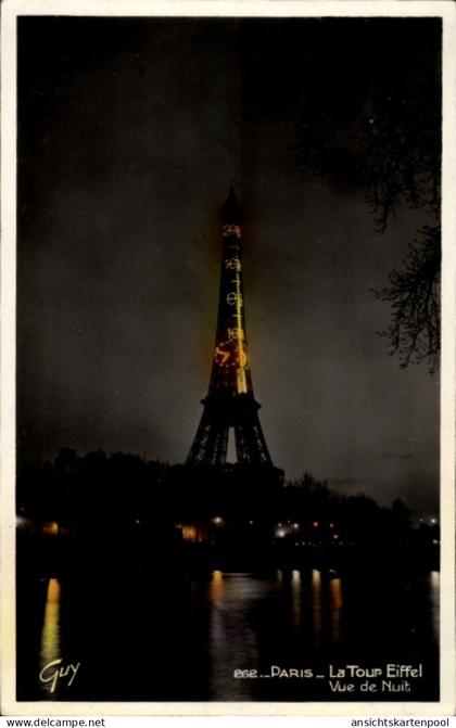 CPA Paris, Boulevard Saint Germain, Eiffelturm bei Nacht, beleuchtet, von Guy