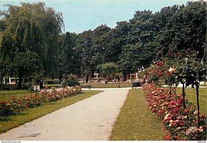 59 - Fourmies - Le Jardin Public - Fleurs - CPM - Voir Scans Recto-Verso