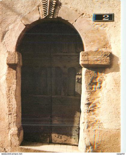 CPM Saint-Pons de Thomieres Porte romane dans la ville ancienne