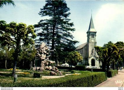 Dun le Palestel - l'église et le square
