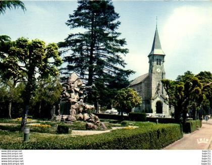 Dun le Palestel - l'église et le square