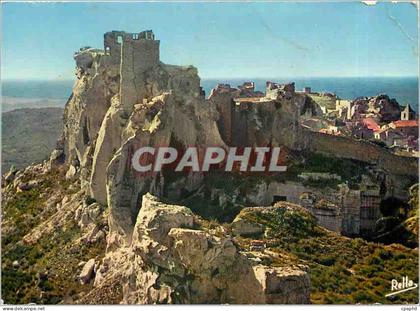 CPM Les Baux de Provence B du R Ruines du Chateau Seigneurial a droite le village