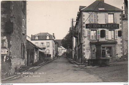 63 MANZAT   La Rue du Marché