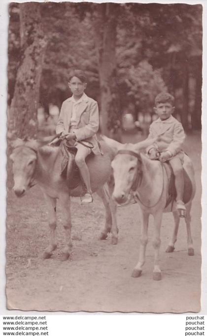 F26-31) SAINT - GAUDENS  - CARTE  PHOTO ROBERT BAUDRY - ENFANTS - PROMENADE A DOS D ' ANES -  ( " SCANS )