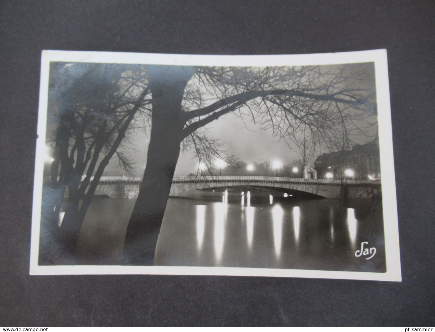 Frankreich 1937 Echtfoto AK Die Tournelle Brücke bei Nacht / Le Pont de la Tournelle le soir / Marke Exposition Internat