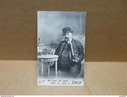 CAUSSADE ou environs (82) carte publicitaire Anis DROP homme fument la pipe gros plan