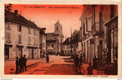 CPA AK Les ABRETS - Rue Gambetta et l'Église (489228)