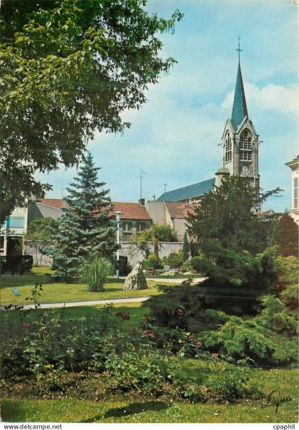 CPM Les Mureaux (Yvelines) Le Parc Jean Vauzelle et l'Eglise