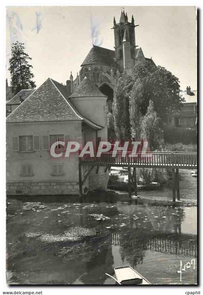 CPA Moret sur Loing S et M l'eglise et le Loing
