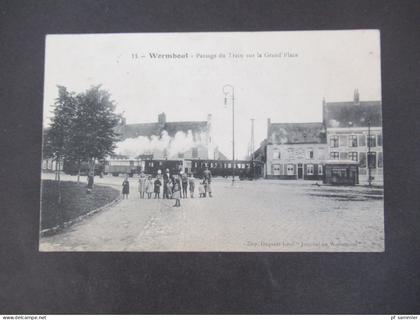 Frankreich um 1910 AK WORMHOUT Passage du Train sur la Grand Place / Eisenbahn / Dampflok mit Waggons
