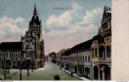 CPA Golßen in der Niederlausitz, Golssen N. L., Straßenansicht mit Kirche