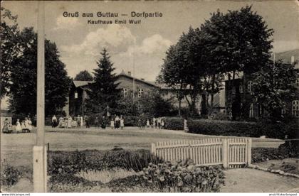 CPA Guttau Malschwitz in der Oberlausitz, Kaufhaus, Passanten