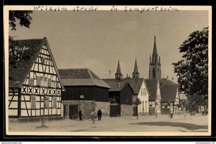 AK Lampertheim, Wilhelmstrasse mit Passanten