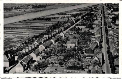 CPA Konz an der Mosel, Luftaufnahme von Konz, Wohngebiete, Mosel im Hintergrund, Häuser, Straßen