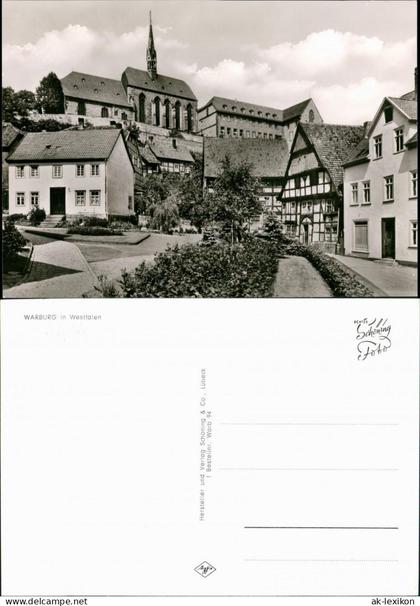 Ansichtskarte Warburg Teilansicht, Strassen Partie mit Blick zur Kirche 1960