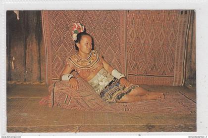 A Dayak girl in longhouse. Sarawak. *