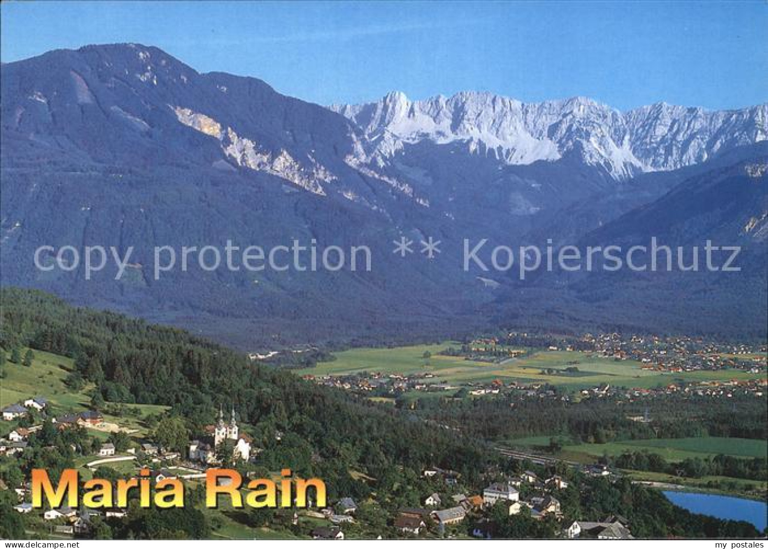 Maria Rain Kaernten Panorama Wallfahrtsort gegen Ferlach und Koschuta Bergmassiv