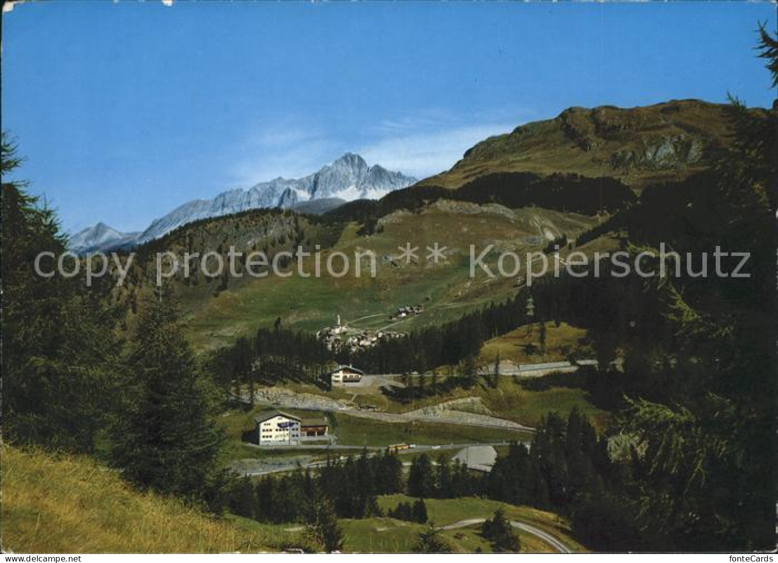 Marmorera Schulhaus mit Sur Flix und Piz Mitgel