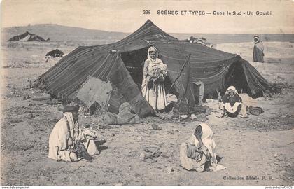 B91903 types folklore dans le sud un gourbi  in the south a foxhole   africa