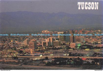 D283232 Tucson Arizona Tucson at Sunset Nestled Below the Santa Catalina Mountai