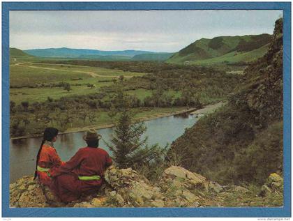 214571 / The Tuul River or Tula River - WOMAN LONG HAIR AND MAN , Mongolia Mongolei Mongolie