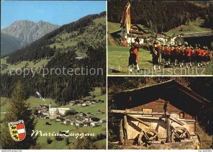 Maria-Luggau Wallfahrtsort im Lesachtal Wasserrad Musikkapelle