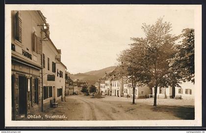 AK Obdach /Steiermark, Strassenpartie mit Tabakladen