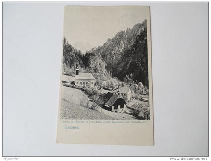 AK Gesäuse. Kirche u. Pfrarrhof in Johnsbach gegen Buchstein u. Oedsteingrat. Franz Oblasser Donner-Wirt. Strichstempel