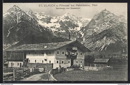 AK St. Ulrich am Pillersee, Gasthaus Strasserwirt mit Blick auf die Steinberge