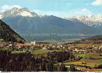 Arzl Pitztal Tirol AT Dorfansicht Kirche Bergpanorama Pitztal Haeuser Felder Wal