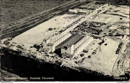 CPA Dronten Flevoland Niederlande, Graansilo's, Luchtfoto, Fliegeraufnahme