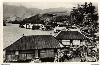 Dutch New Guinea, Papua Stilt Houses (1950s) RPPC Postcard