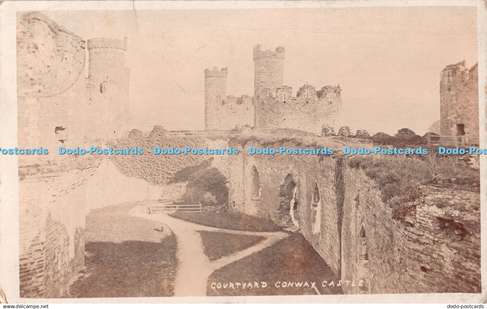 R479180 Conway Castle Courtyard T R Hammond 1910