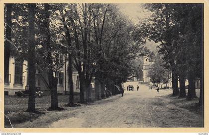 Böhmen und Mähren – Ansichtskarte Hukvaldy – Ortsansicht mit Kirche – gelaufen