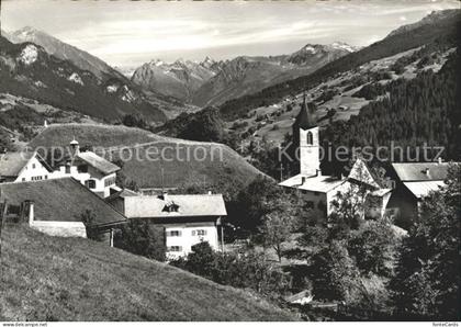 Luzein Ortsansicht mit Kirche Panorama Blick gegen Silvrettagruppe