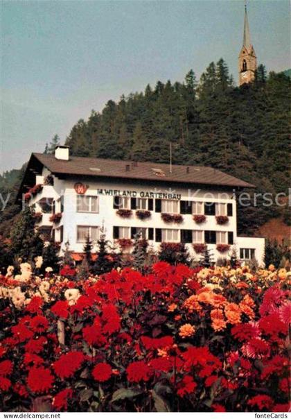 Tamins Kirche Blumenschau Geschaeftshaus