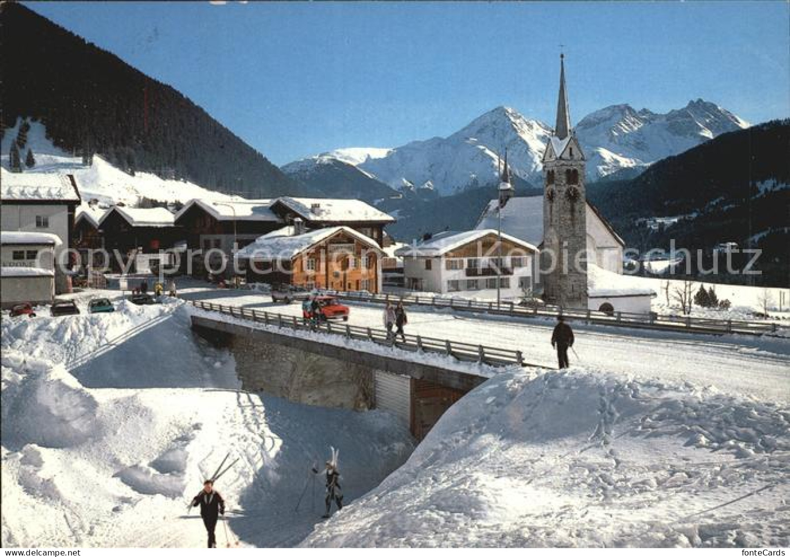 Sedrun Tujetsch Ortsansicht Kirche Winter