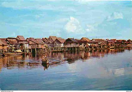 Carte Postale - Singapour - Houses on slits - CPM - Voir Scans Recto-Verso - Poscard - Carta Postal -  Postkarte