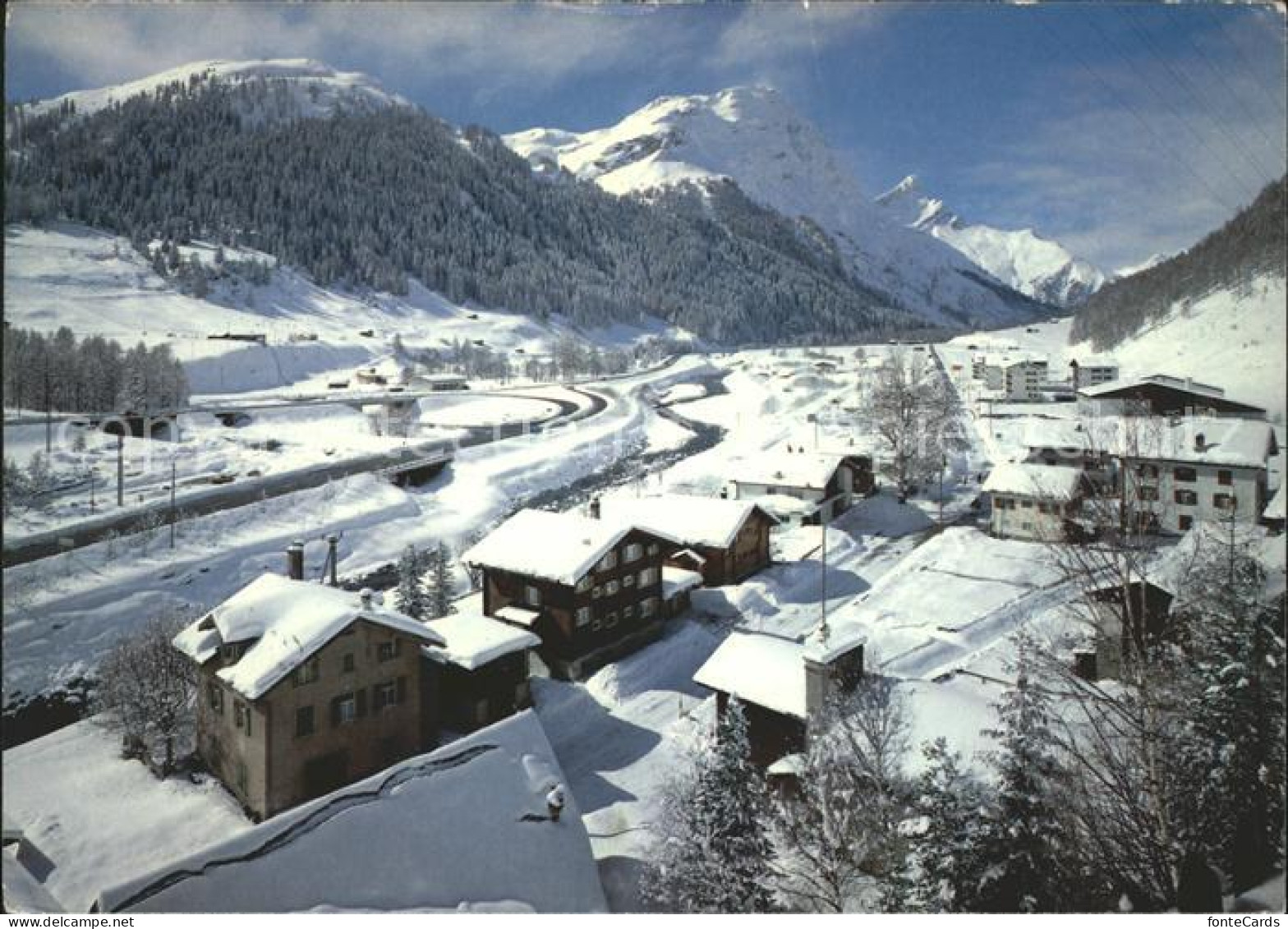 Spluegen GR im Rheinwald mit Danatzhoehe Guggernhuell und Einshorn Winterpanoram