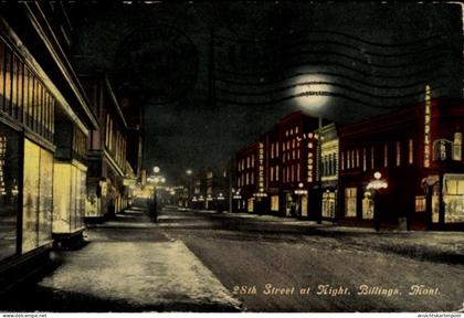 CPA Billings Montana USA, 28th Street bei Nacht, Geschäfte, Straßenlaternen,