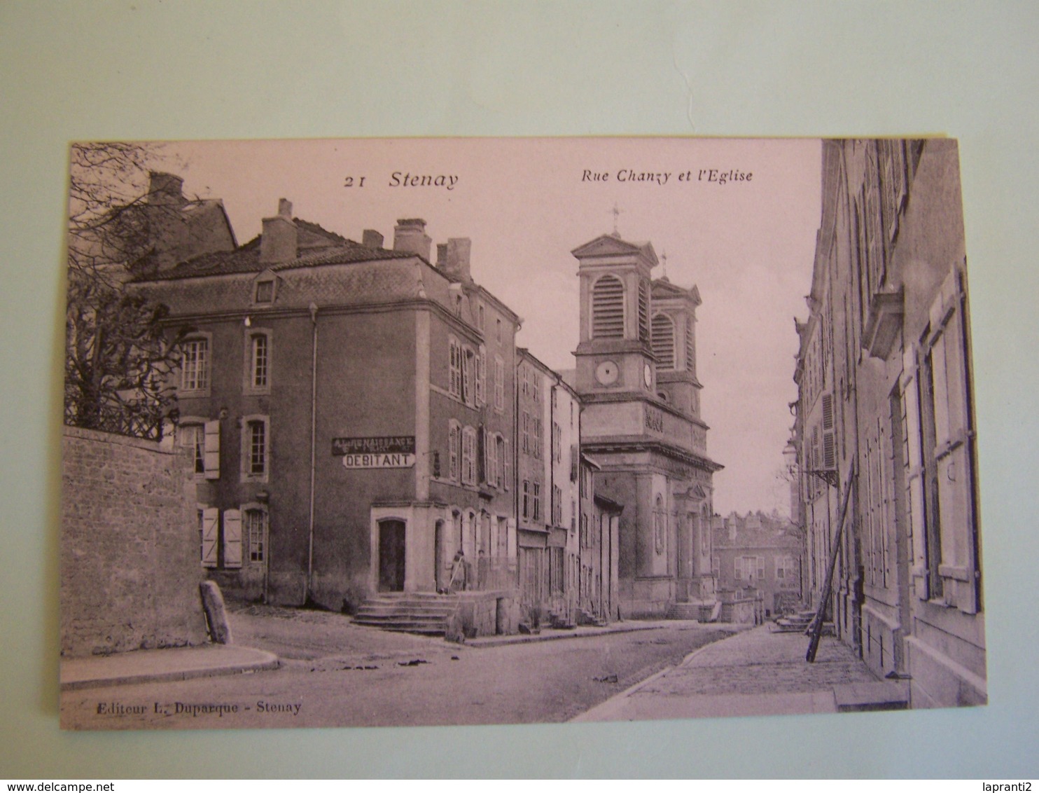 STENAY (MEUSE) LES COMMERCES. RUE CHANZY ET L'EGLISE.