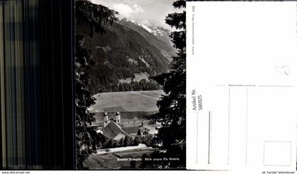 586925,Foto Ak Disentis/Muster Kloster Disentis Blick geg. Piz Medels Switzerland