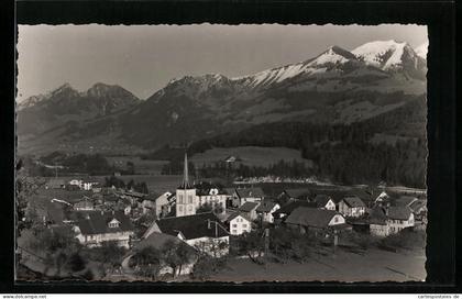 AK Neirivue, Ortsansicht mit Bergen