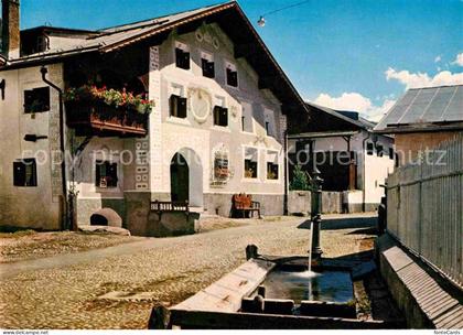 Scuol Tarasp Vulpera Engadiner Haus in Scuol Dorfbrunnen