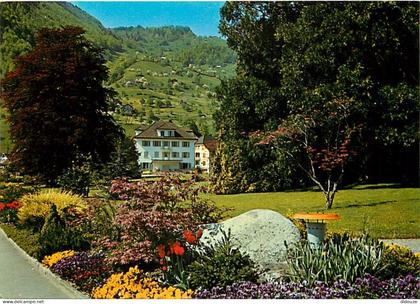 Carte Postale - Suisse - SZ Schwyz - Gersau am Vierwaldstattersee - Kurparkanlage mit Rathaus - Fleurs - CPM - Carte Neu