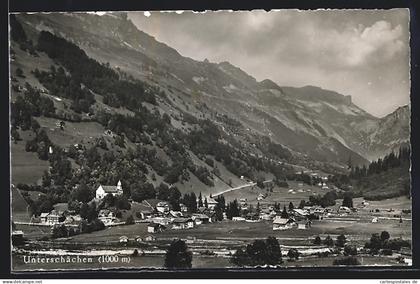 AK Unterschächen, Teilansicht mit Bergen